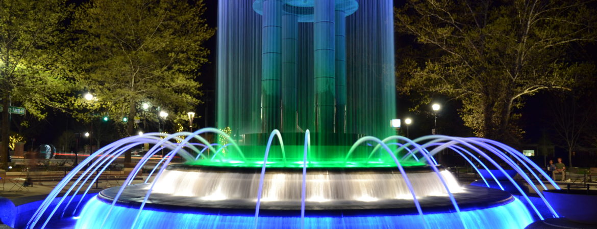 Downtown park fountain at night